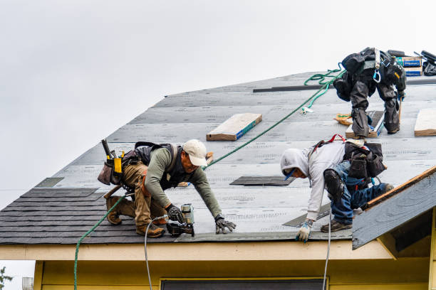Professional Gutter Installation technician working in Mineola, IA